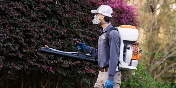 Pest Control Tech Spraying Mosquito control